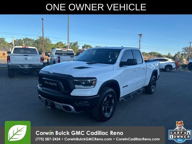 2019 RAM 1500 Rebel Quad Cab 4x4 6'4" Box in White — front three-quarter view