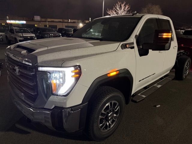 2026 GMC Sierra 3500 HD SLE in Summit White — front three-quarter view