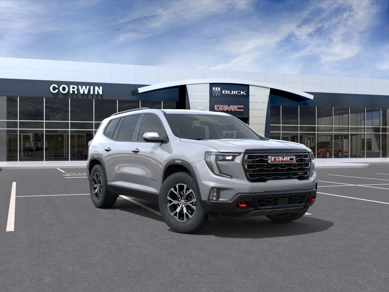 2026 GMC Acadia AT4 in Sterling Metallic — front three-quarter view