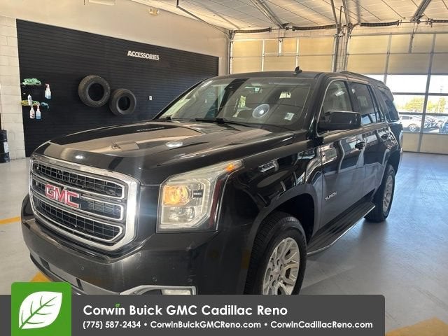 2015 GMC Yukon SLT in Onyx Black — front three-quarter view