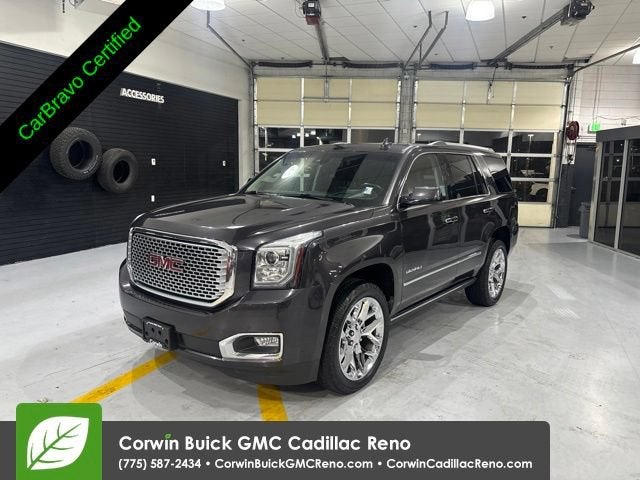 2017 GMC Yukon Denali in Iridium Metallic — front three-quarter view