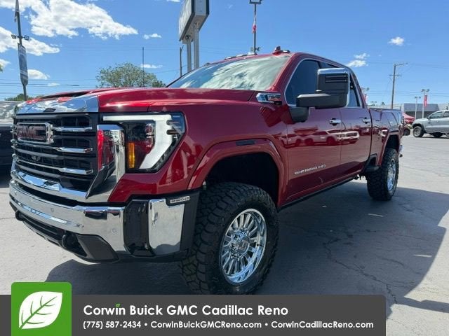2026 GMC Sierra 2500 HD SLT in Volcanic Red Tintcoat — front three-quarter view