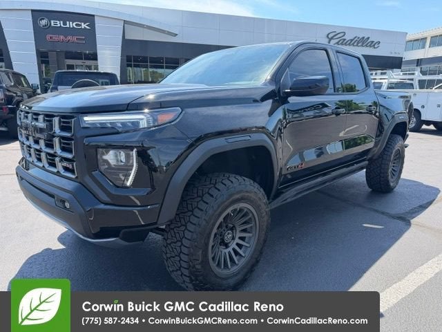 2026 GMC Canyon AT4 in Onyx Black — front three-quarter view