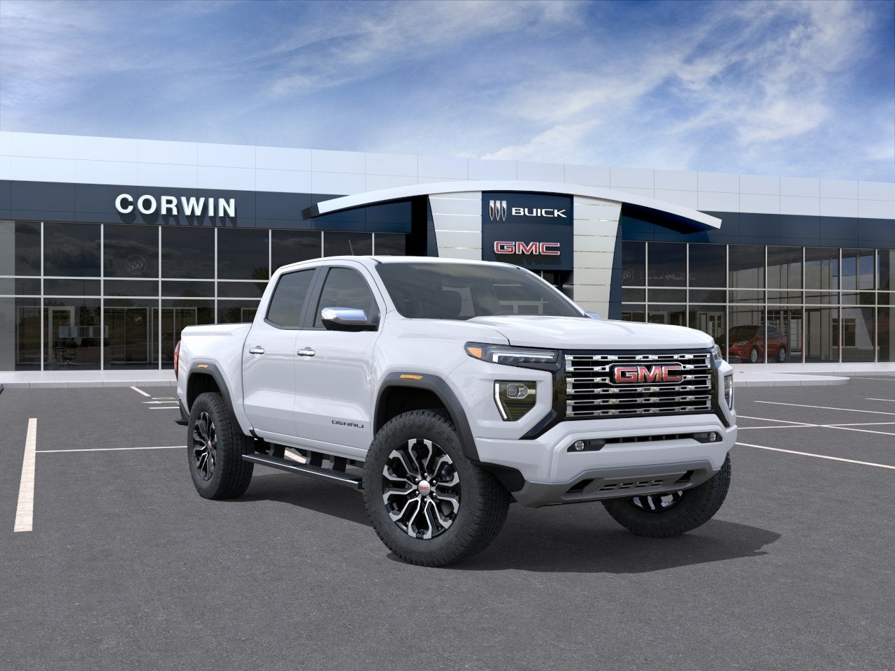 2026 GMC Canyon Denali in Summit White — front three-quarter view