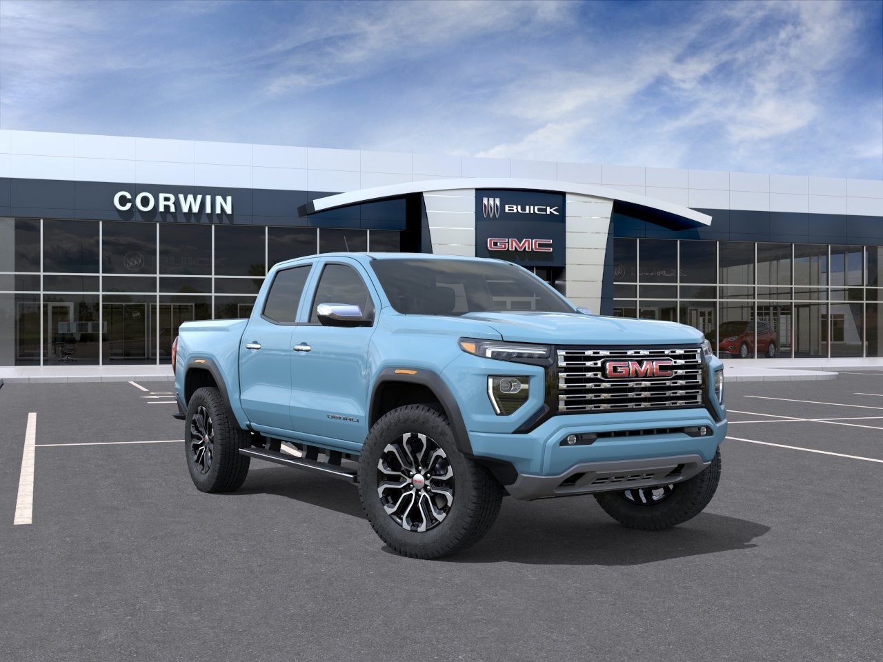 2026 GMC Canyon Denali in Glacier Metallic — front three-quarter view