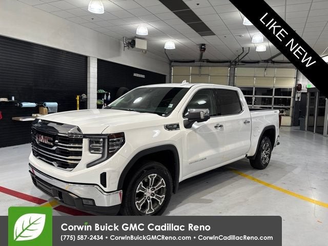2025 GMC Sierra 1500 SLT in Summit White — front three-quarter view