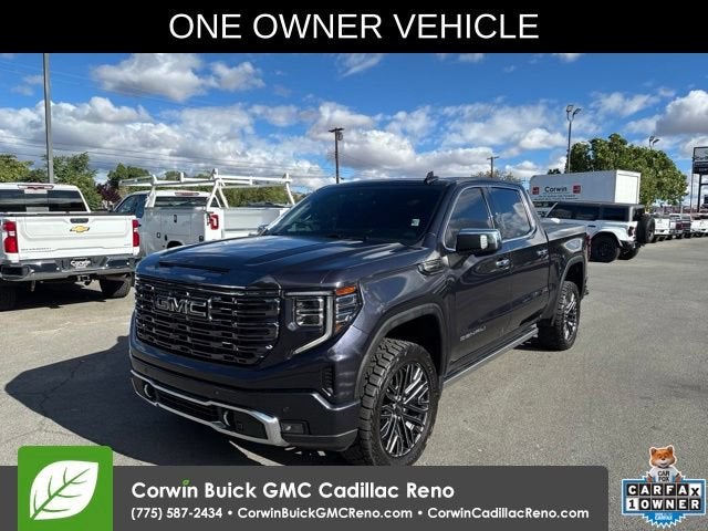 2022 GMC Sierra 1500 Denali Ultimate in Titanium Rush Metallic — front three-quarter view