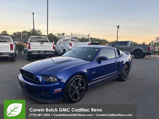 2013 Ford Mustang GT in Blue — front three-quarter view