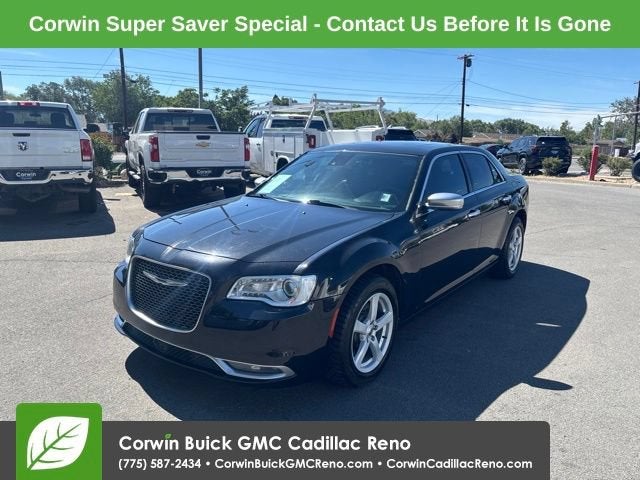 2015 Chrysler 300C Platinum AWD in Black — front three-quarter view