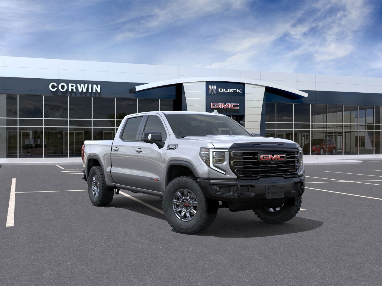 2026 GMC Sierra 1500 AT4X in Sterling Metallic — front three-quarter view