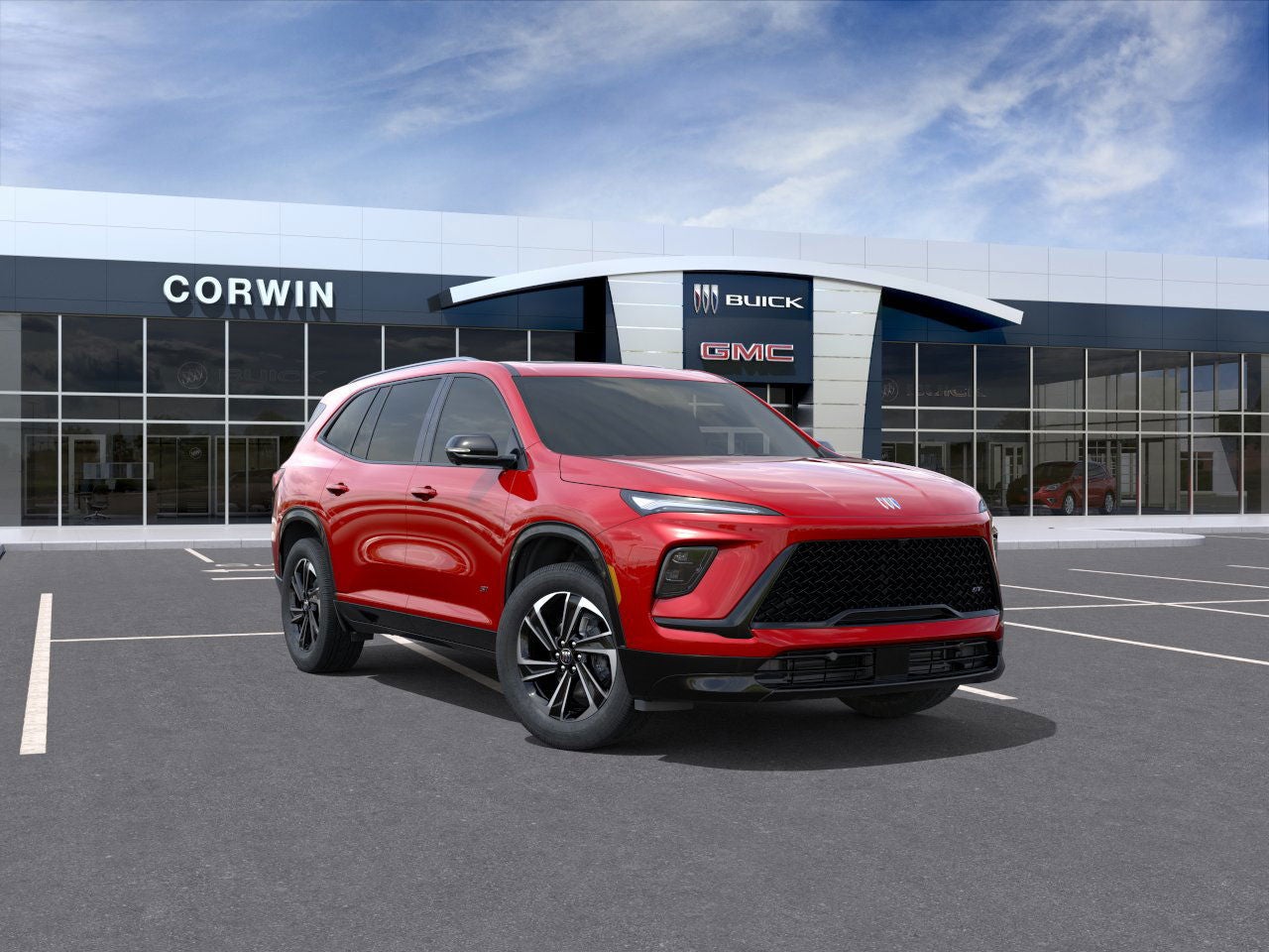 2026 Buick Enclave Sport Touring in Cherry Red Tintcoat — front three-quarter view