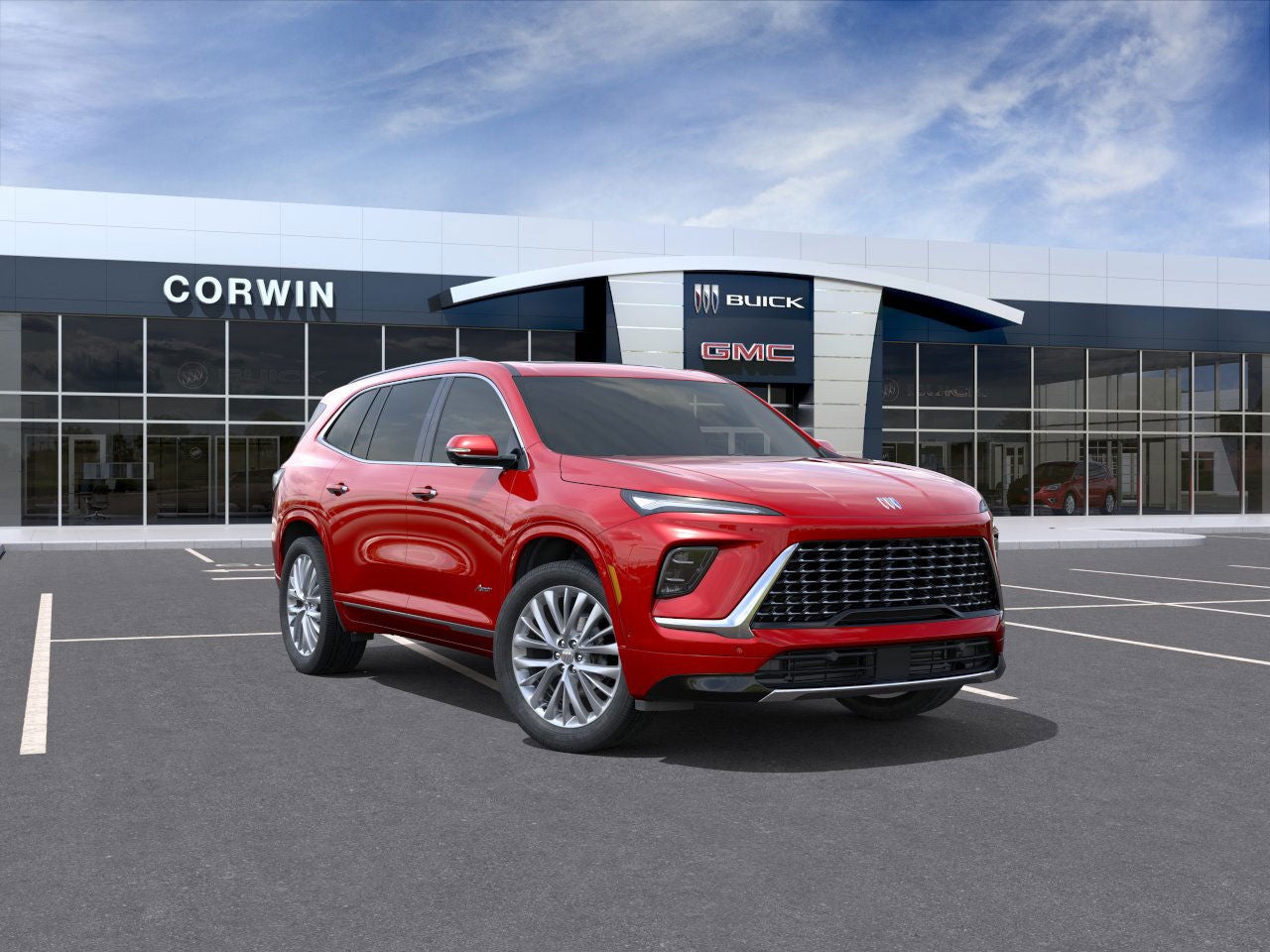 2026 Buick Enclave Avenir in Cherry Red Tintcoat — front three-quarter view