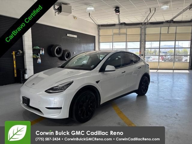 2021 Tesla Model Y Long Range in White — front three-quarter view