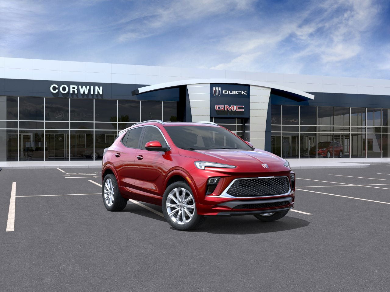 2026 Buick Encore GX Avenir in Brilliant Red — front three-quarter view