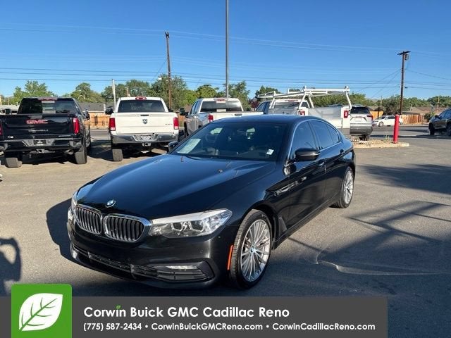 2018 BMW 530i xDrive in Black — front three-quarter view